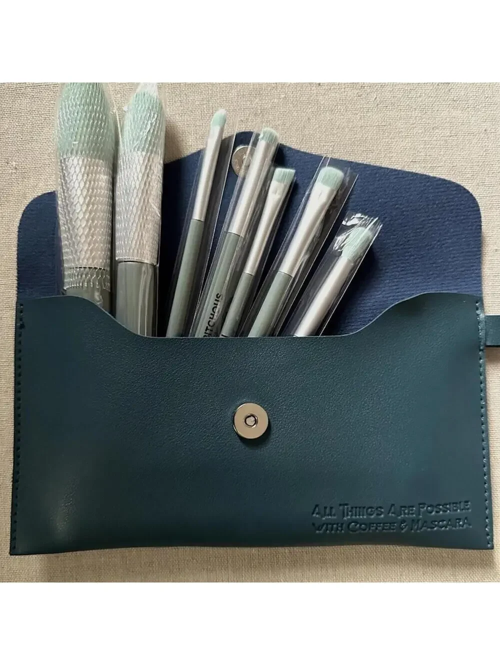 Makeup brush set with blue snap close wristlet NWT